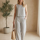 Z Supply The Scout striped summer top on a virtual model, showcasing a casual, lightweight basic with horizontal gray and white stripes.