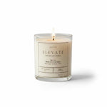 Natural soy wax candle by Graced, featuring a minimalist design in a clear glass container, perfect for home fragrance.