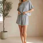 Allie Rose embroidered linen tie shorts, stylish lightweight bottoms with intricate embroidery and adjustable waist tie.