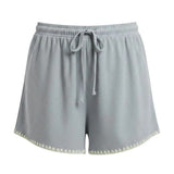 Allie Rose embroidered linen tie shorts featuring elegant embroidery, lightweight fabric, and a stylish relaxed fit for summer wear.