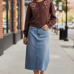 Brown floral embroidered knit cardigan by Forte, showcasing intricate embroidery and cozy knit fabric, perfect for casual wear.