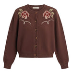 Brown floral embroidered knit cardigan from Forte, featuring intricate floral embroidery and a cozy knit texture.