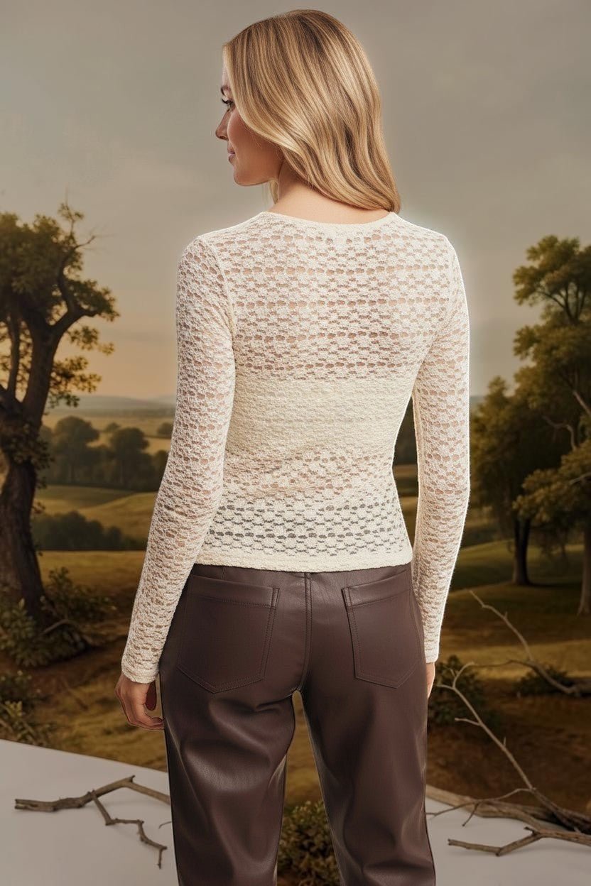 Ivory floral lace knit top by Forte featuring delicate lace details and a soft, fitted knit fabric.