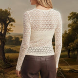Ivory floral lace knit top by Forte featuring delicate lace details and a soft, fitted knit fabric.