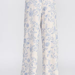 Allie Rose floral linen pants with small blue blossom print, relaxed fit bottoms for casual or summer wear.