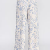 Allie Rose floral linen pants with small blue blossom print, relaxed fit bottoms for casual or summer wear.