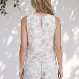 Blue floral linen top by Allie Rose featuring small blossom print, lightweight and casual for everyday wear.