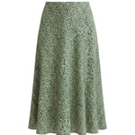 graced midi skirt in green with a delicate white floral print, featuring a flowing silhouette and polyester fabric.