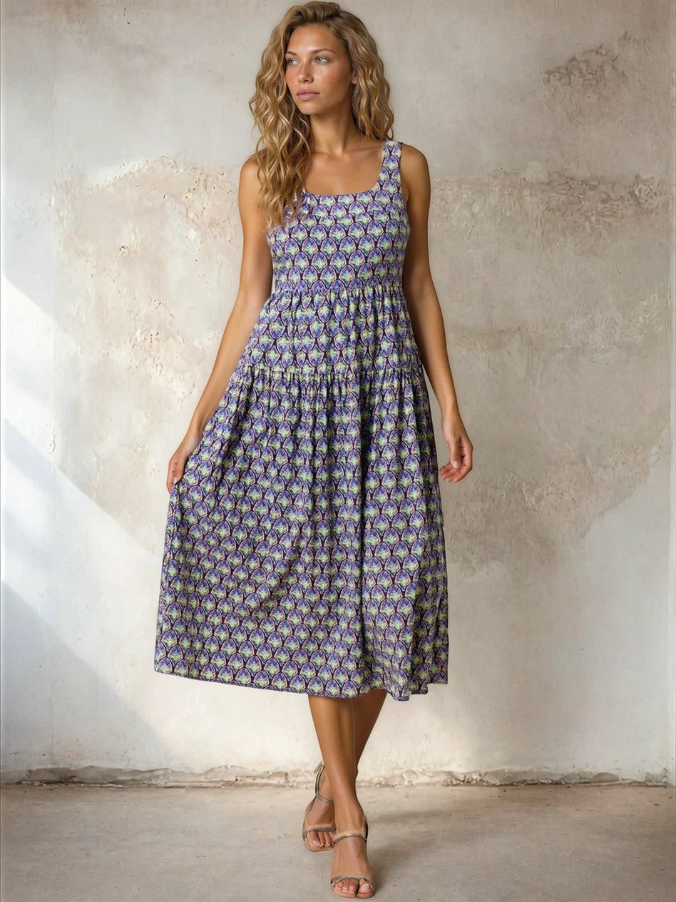 Doe and Rae floral print square neck midi dress with long sleeves, featuring a vibrant floral pattern and elegant fit.