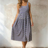 Doe and Rae floral print square neck midi dress with long sleeves, featuring a vibrant floral pattern and elegant fit.