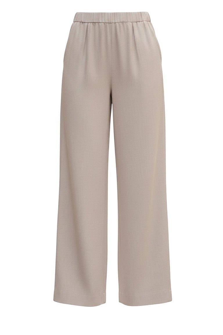 Be Cool beige flowy Tencel wide-leg pants shown on model, featuring a relaxed fit and comfortable casual style.