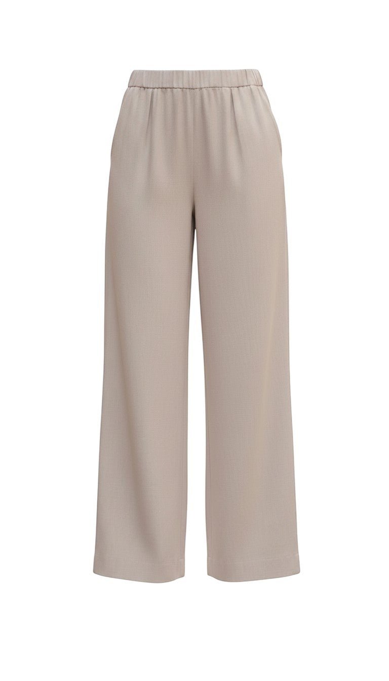 Be Cool beige flowy Tencel wide-leg pants shown on model, featuring a relaxed fit and comfortable casual style.