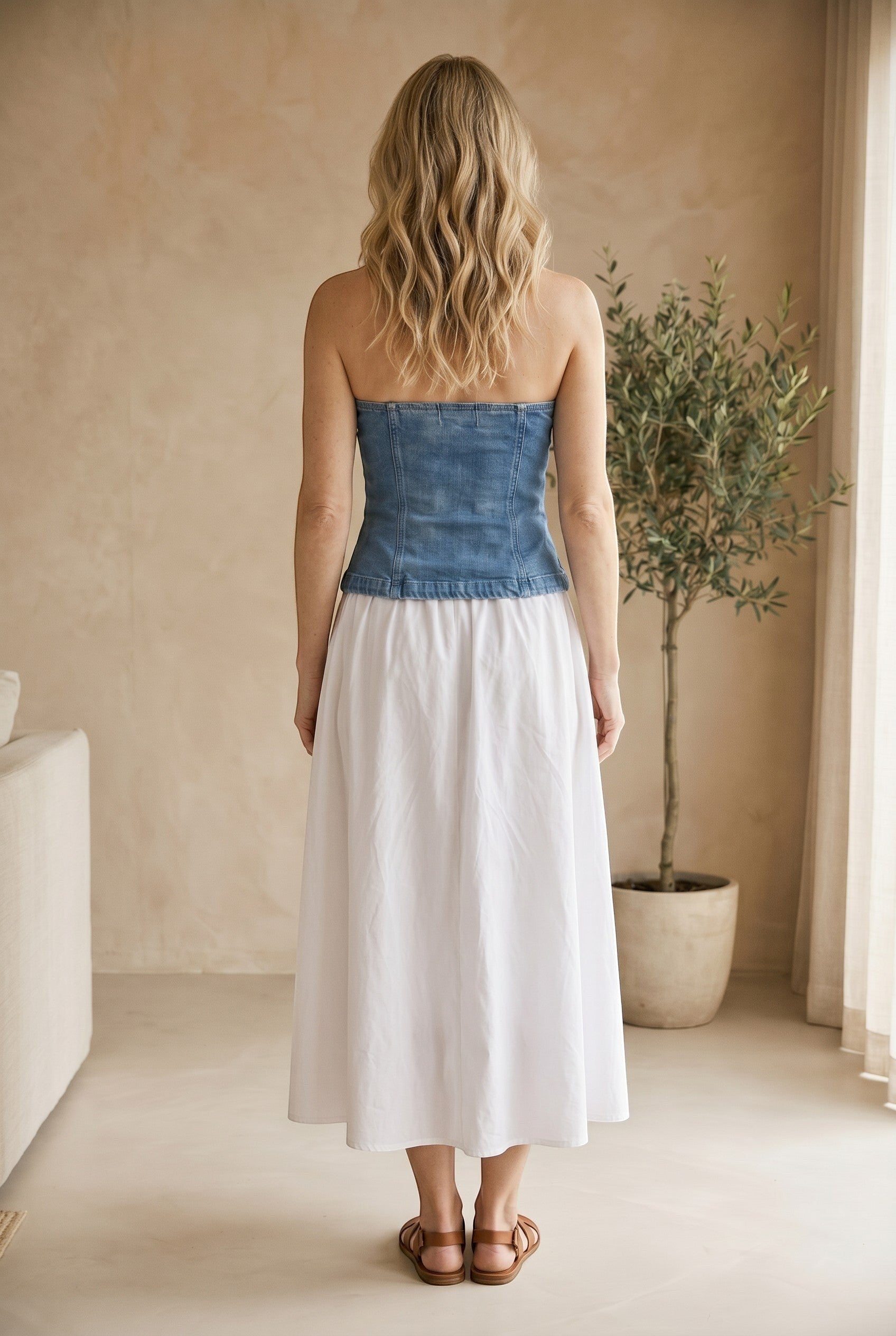 Blue and white strapless contrast skirt maxi dress from Fore Collection featuring a flowy, elegant design.