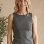 Graced Agnes knit tank top in charcoal grey EcoViscose blend with traveling rib trim detail. Model is wearing a size small.