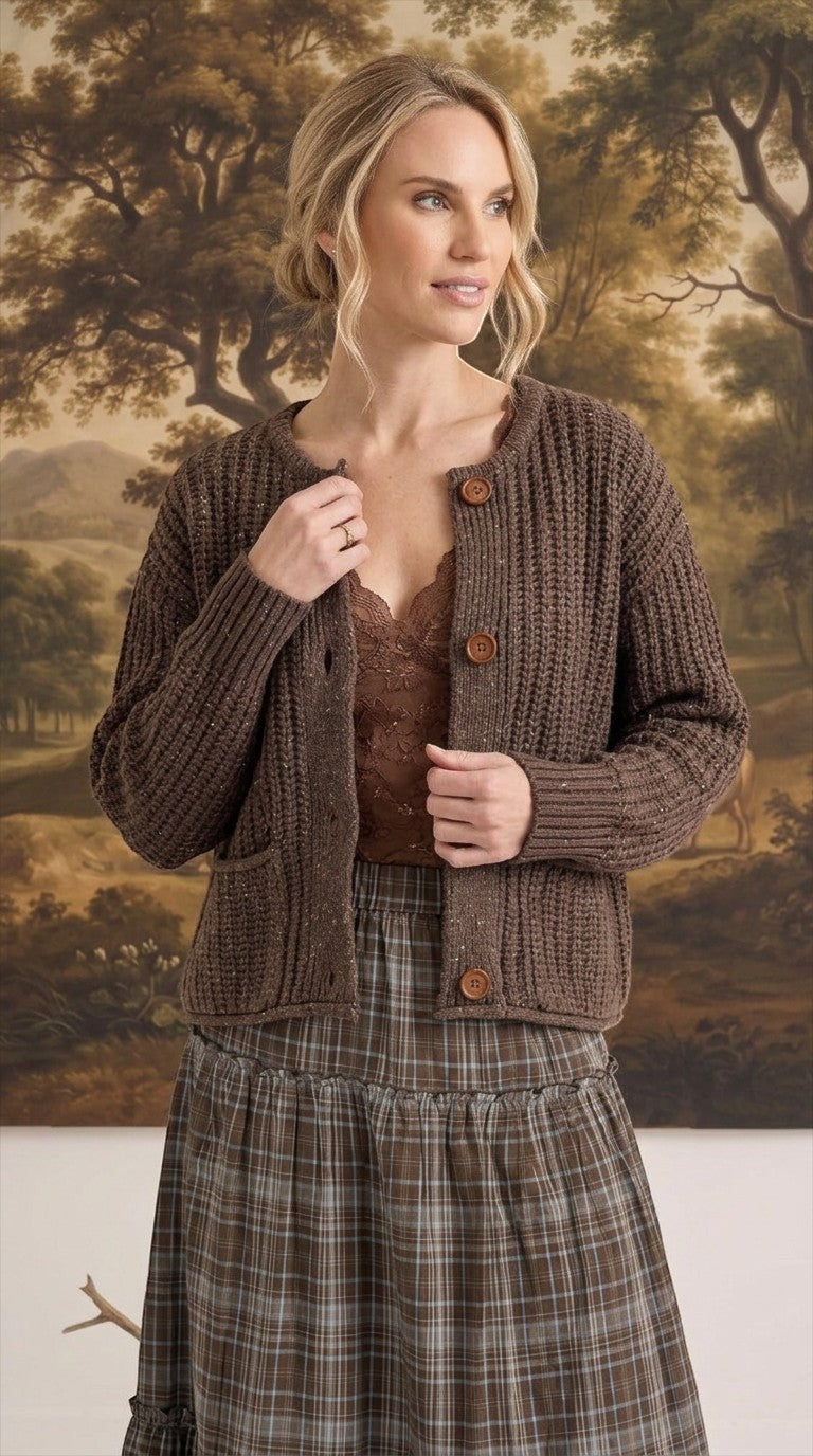 graced Amanda raw edge knit cardigan in dark brown with button front and ribbed texture worn by a woman