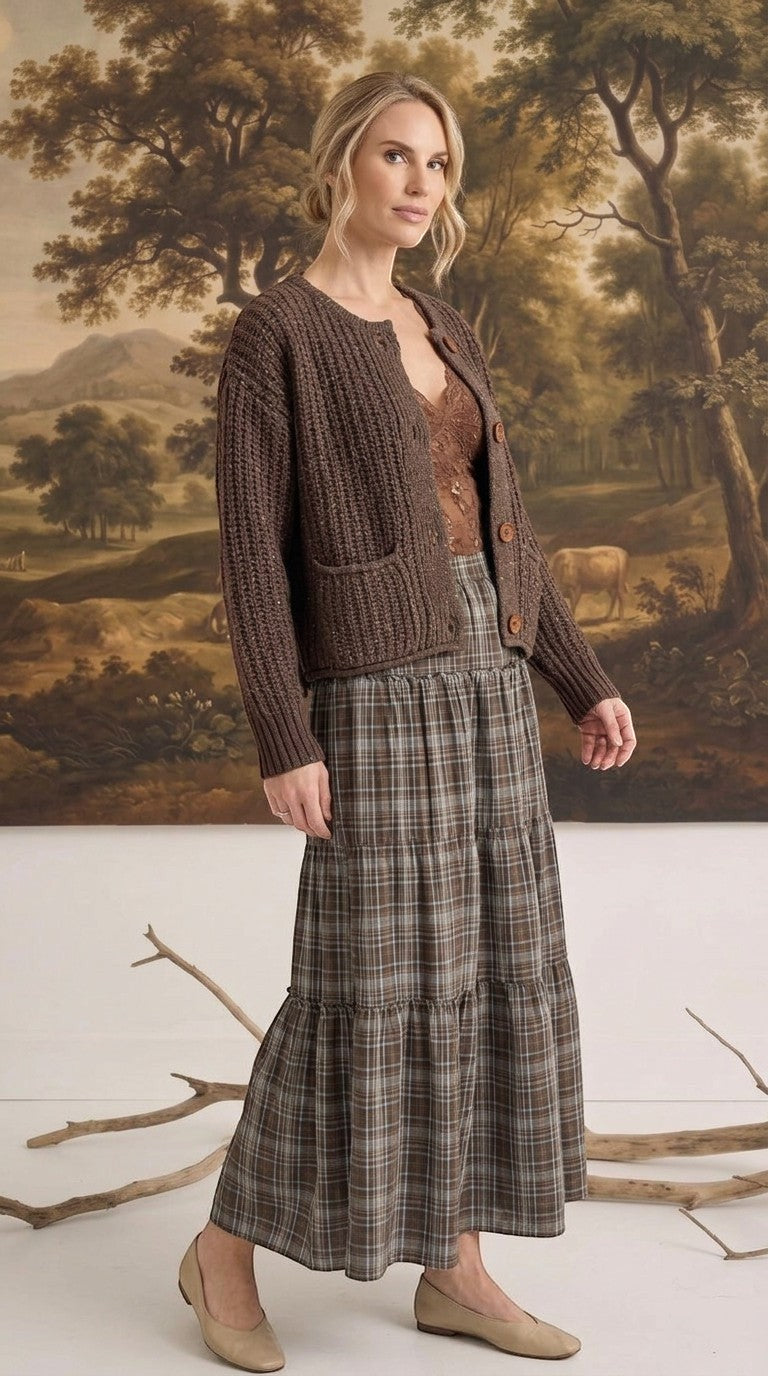 graced Amanda raw edge knit cardigan in dark brown worn by a woman with a plaid tiered skirt and lace camisole