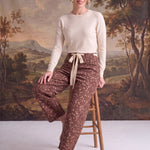 graced Waist Bow Tie Bambi Print Barrel Pants in chocolate brown with spotted pattern and contrasting waist tie