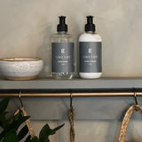 graced Lake Life hand lotion bottle from Bath + Body lotion collection, featuring a natural, soothing design and label details
