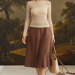 Beige floral lace knit top by Forte, featuring intricate lace details and a stylish knit design for women.