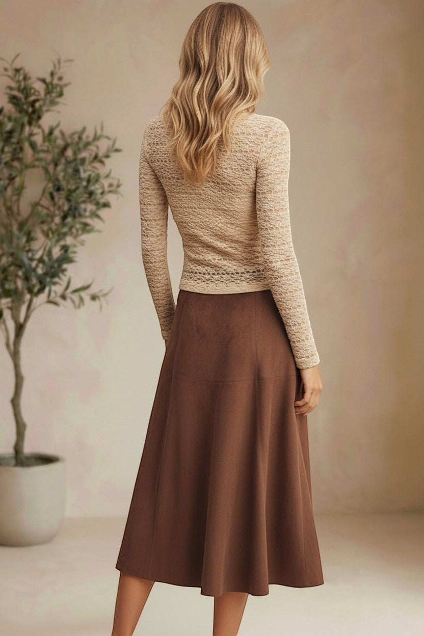 Beige floral lace knit top from Forte featuring intricate lace details and a soft, comfortable knit fabric.