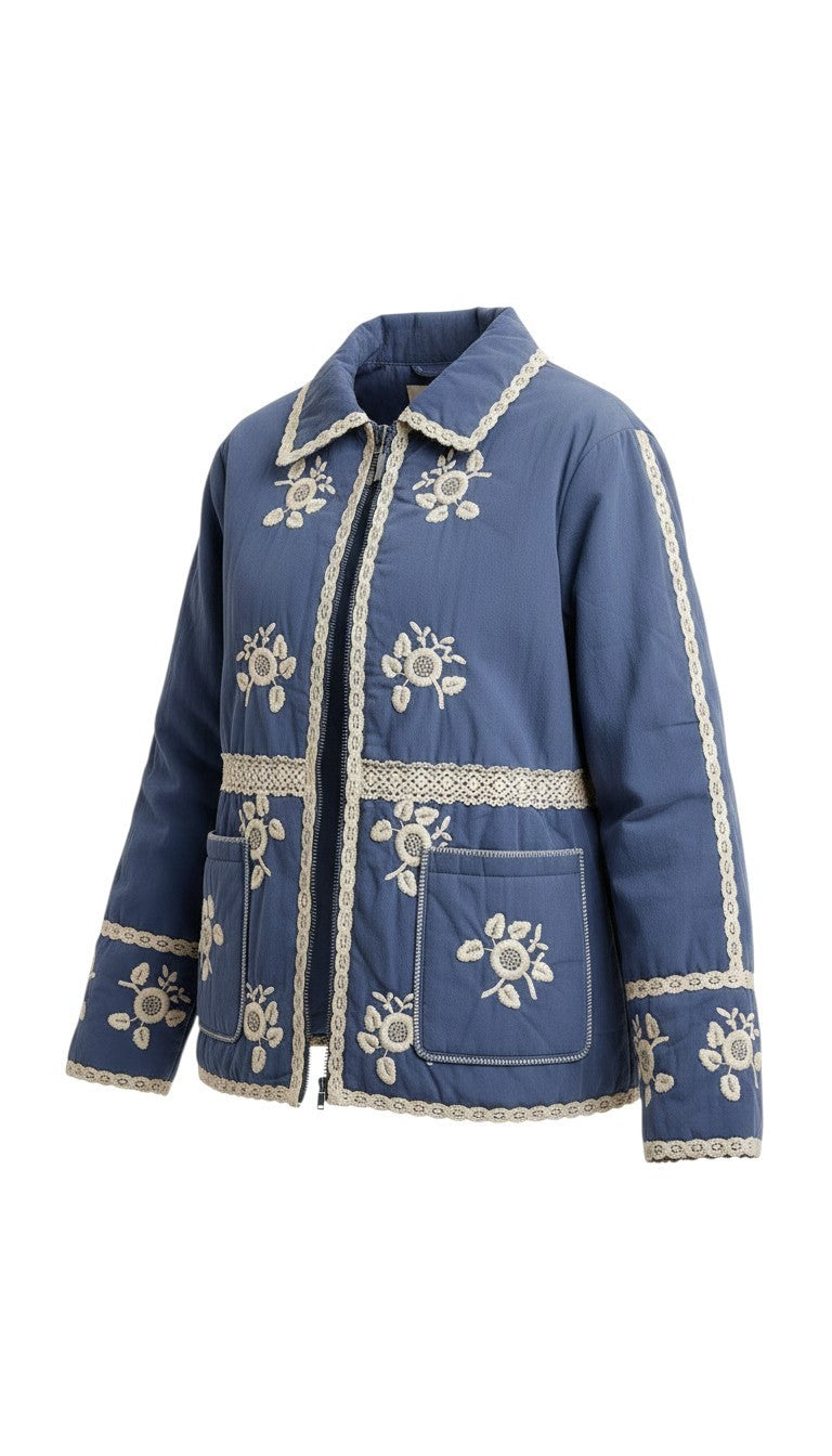 graced The Lea blue cotton jacket with white floral embroidery and lace trim details on a white background