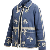 graced The Lea blue cotton jacket with white floral embroidery and lace trim details on a white background