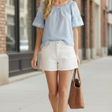 Blue embroidered raglan short sleeve top by Lovestitch, featuring floral embroidery on a casual blouse.
