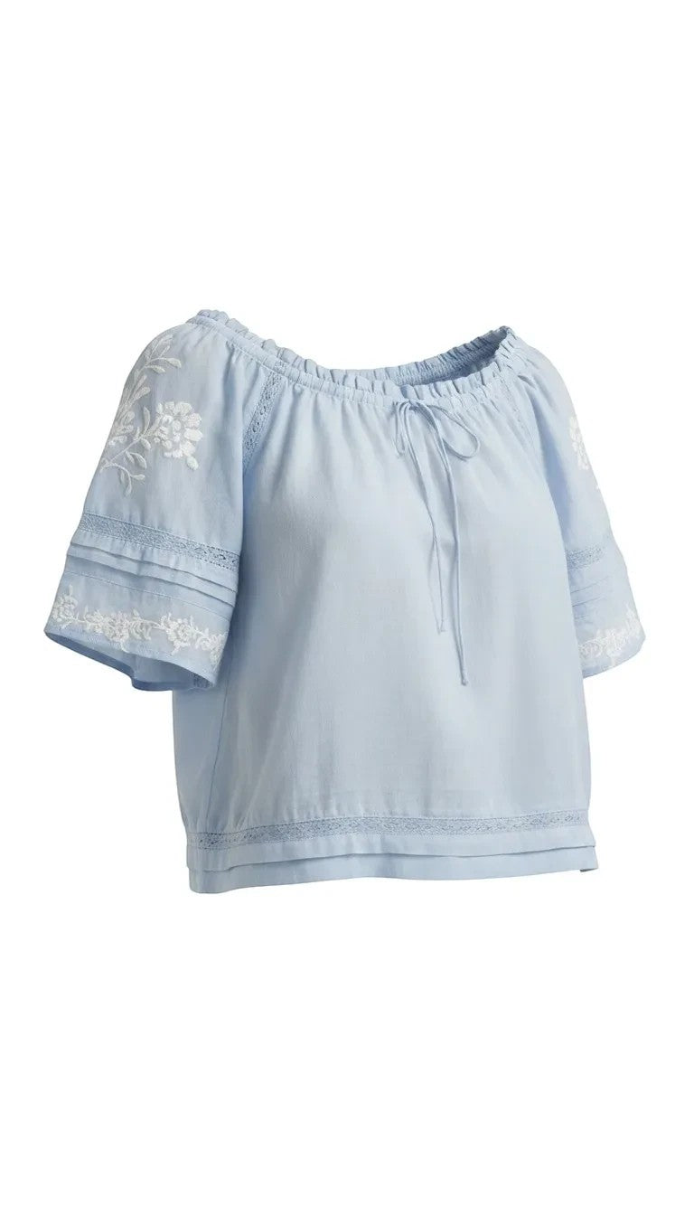 Blue embroidered raglan short sleeve top from Lovestitch, featuring floral embroidery on the sleeves and a relaxed fit blouse.