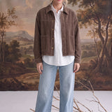 graced The Jess brown cotton corduroy jacket worn over a white shirt and light wash jeans