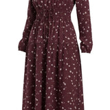 graced Audrey midi dress in burgundy with white floral print, featuring long sleeves, v-neck, and drawstring waist.