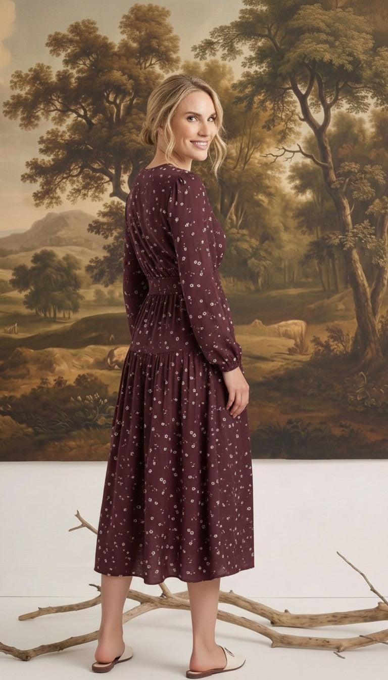 graced Audrey floral midi dress in deep burgundy with long sleeves and v-neckline worn by a blonde model