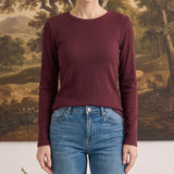 graced Basic Baby ribbed long sleeve top in deep burgundy worn by a woman with blue jeans