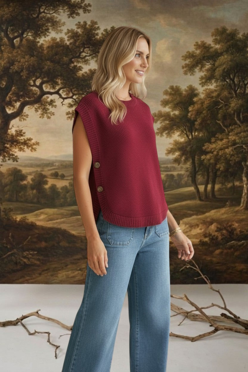 Burgundy crew neck sweater vest from in February, a stylish knit top with a classic fit and ribbed details.