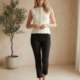 Cream knit button-up sweater vest from Be Cool, featuring a classic fit and ribbed neckline and armholes.