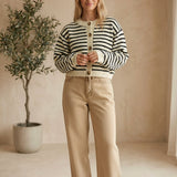 Navy chunky knit striped cardigan by Miou Muse, featuring a cozy, thick sweater with horizontal blue and white stripes.