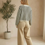 Navy chunky knit striped cardigan by Miou Muse, featuring a cozy, textured sweater with bold horizontal stripes.