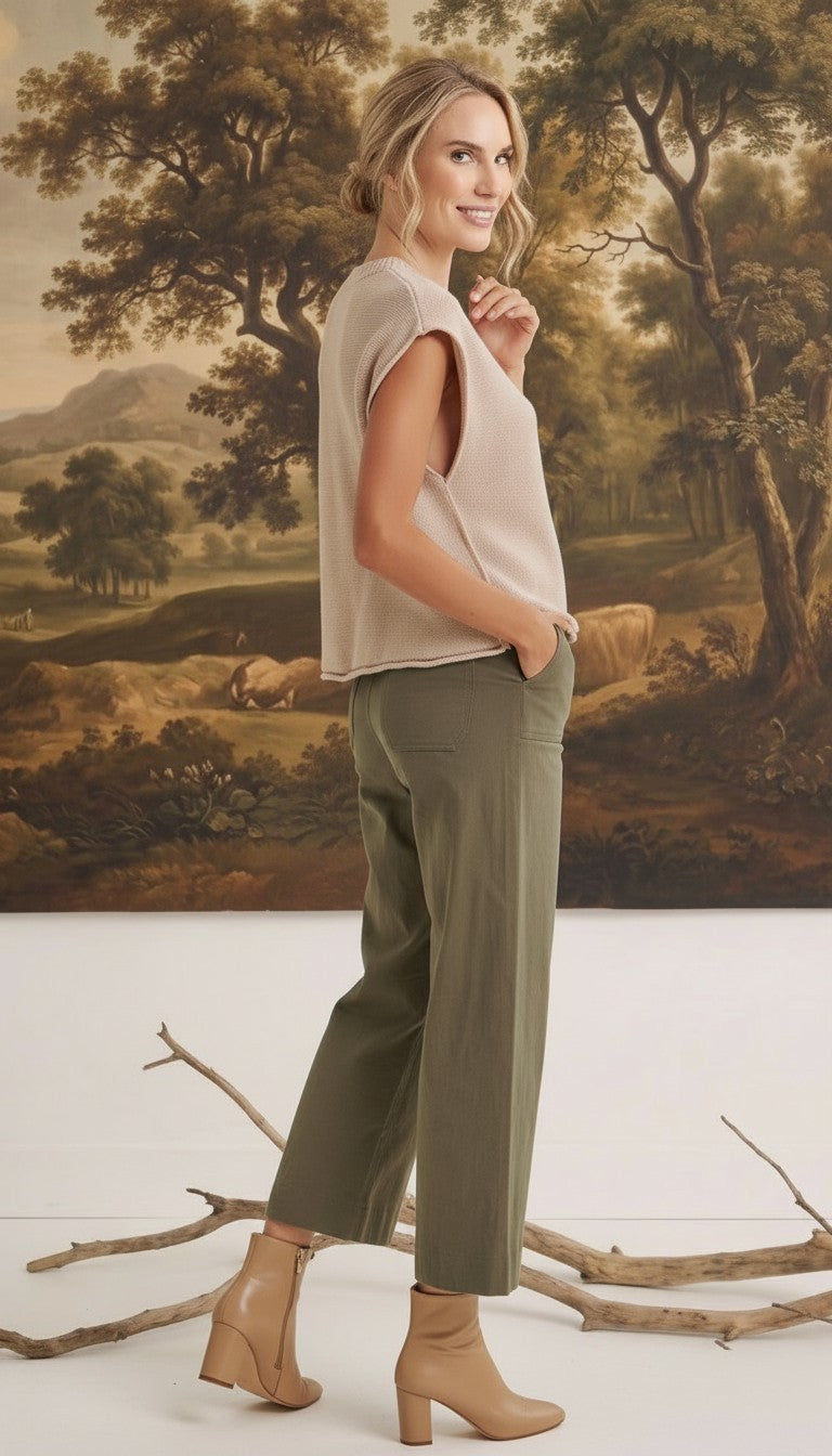 graced The Darcy wide-leg pants in dark olive with pocket detail, worn by a blonde model in a beige sleeveless top.