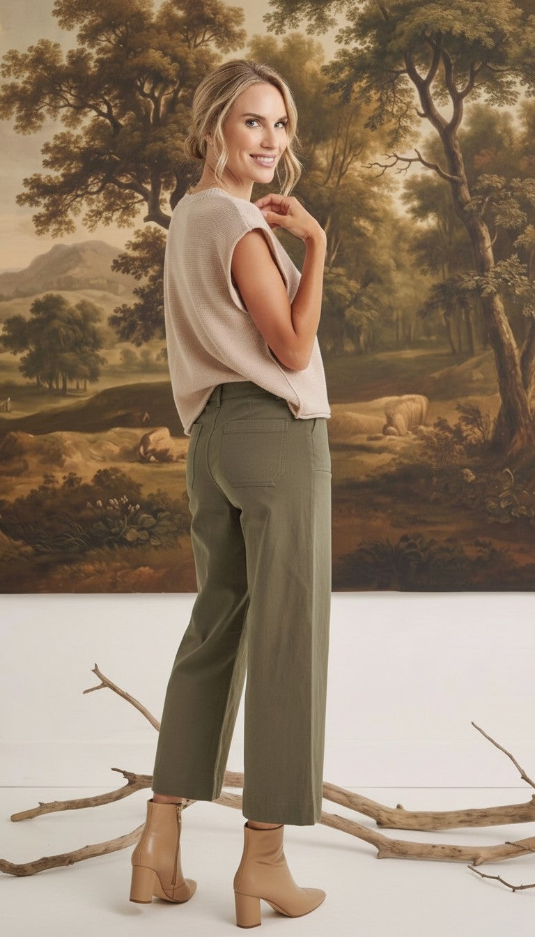graced The Darcy wide-leg pants in dark olive with pocket detail worn by a model with a beige top and ankle boots