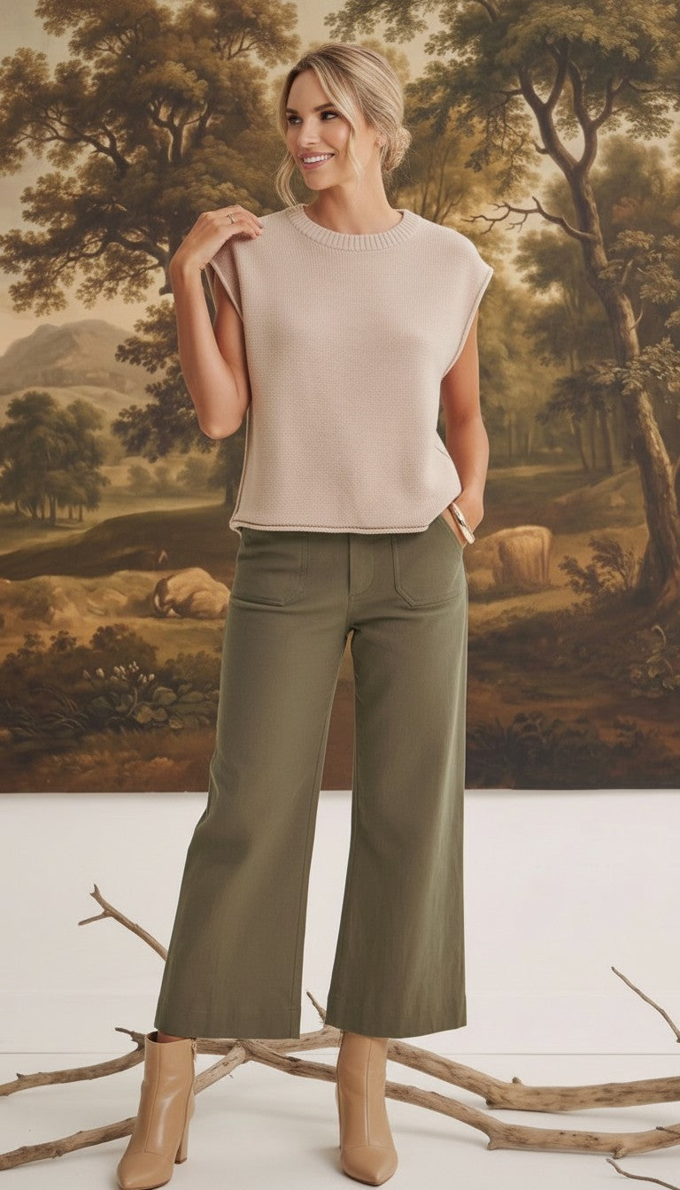 graced The Darcy wide-leg pants in dark olive with front pocket detail, styled with a beige knit top and ankle boots.