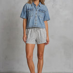 Light wash Wishlist Clara denim shirt with short sleeves and front pocket detail, casual and stylish for everyday wear.
