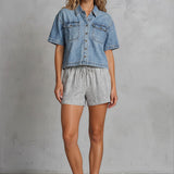 Light wash Wishlist Clara denim shirt with short sleeves and front pocket detail, casual and stylish for everyday wear.
