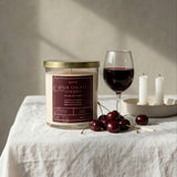 Graced Door County Cherry soy candle in a glass jar, natural home fragrance with a cherry scent, perfect for cozy ambiance.