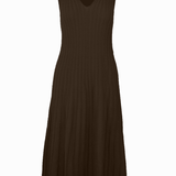 Graced Skyler Dress in soft pastel with flowy fabric, featuring a V-neckline and long sleeves, displayed on a mannequin.