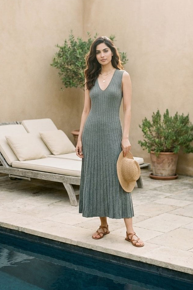 Elegant Skyler Dress by graced featuring a flowing design and stylish silhouette, showcased on a model against a neutral background.
