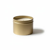 Graced Egg Harbor natural soy wax candle in a gold tin, designed for home fragrance and ambiance.