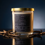 Egg Harbor natural soy wax candle by graced, showcasing a simple white candle with a wooden wick in a glass jar.