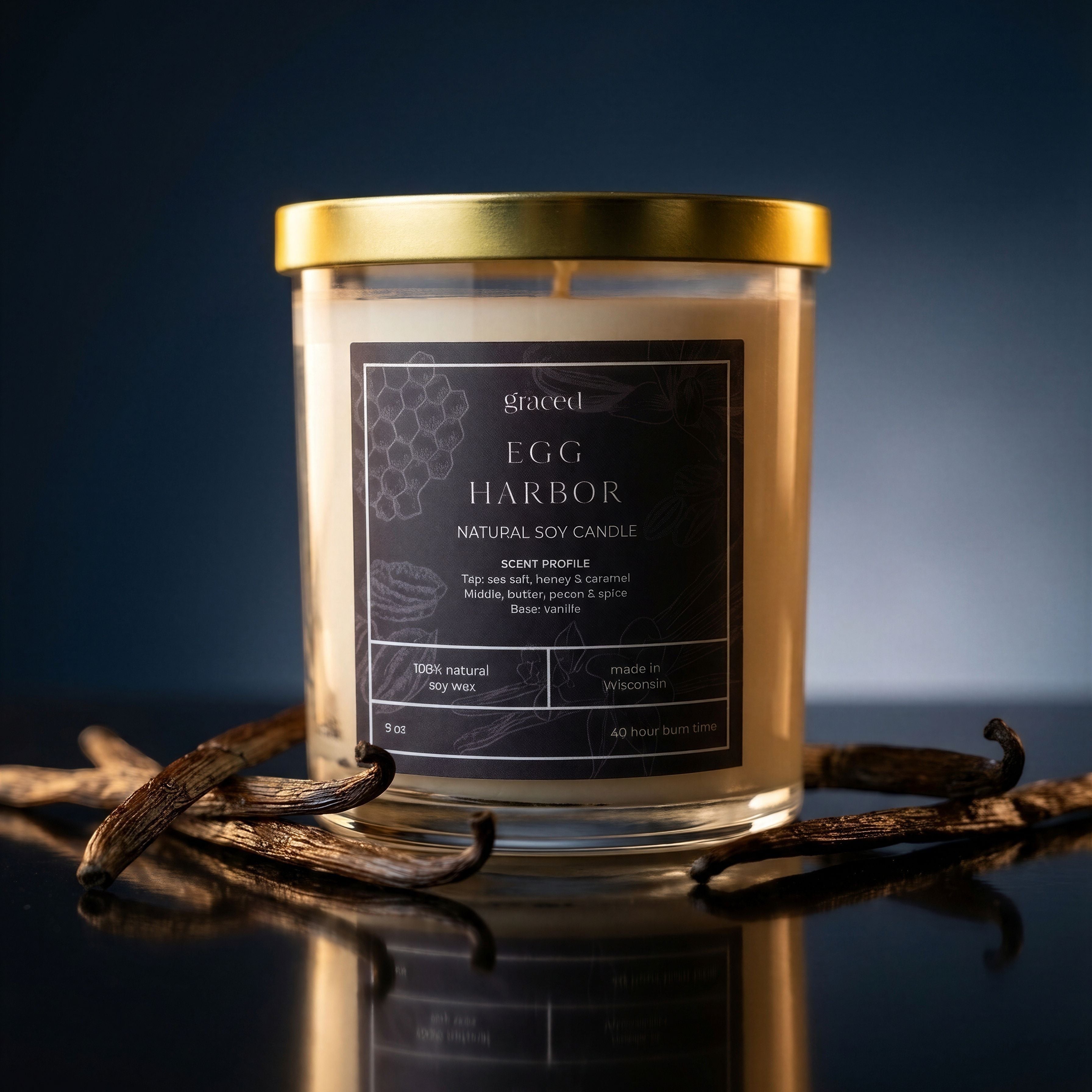 Egg Harbor natural soy wax candle by graced, showcasing a simple white candle with a wooden wick in a glass jar.
