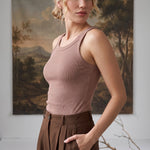 graced Ellie Bra Free Tank in taupe, a soft ribbed sleeveless top worn by a model with brown trousers