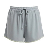 Allie Rose embroidered linen tie shorts featuring elegant embroidery, lightweight fabric, and a stylish relaxed fit for summer wear.