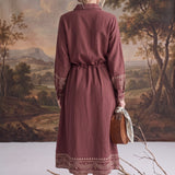 graced embroidered button front midi dress in maroon with long sleeves, drawstring waist, and contrast detailing